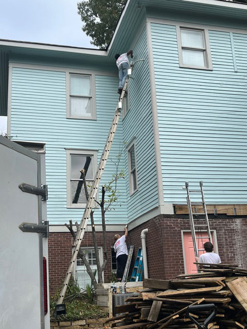 Blue siding residential exterior repaint